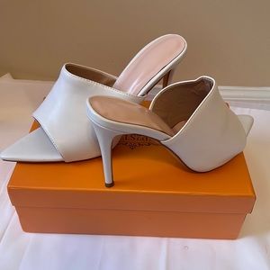 White mules. Size 10.